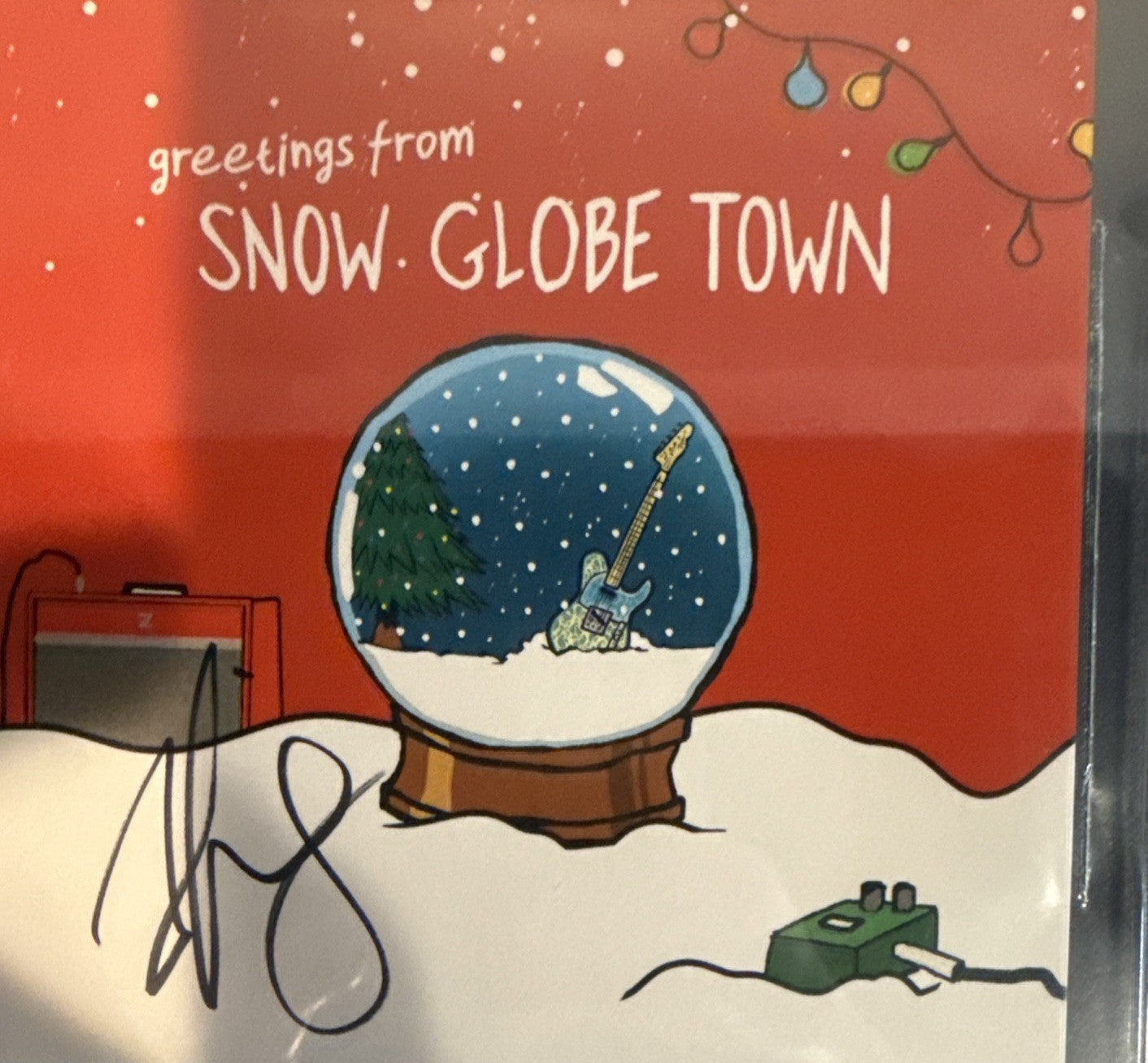 Brad Paisley SIGNED CD Insert “Snow Globe Town” - Beckett BAS Encased Slab