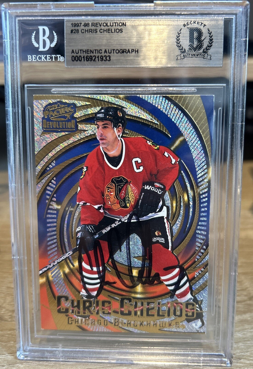 Signed Chris Chelios 1997-98 Pacific Revolution #28 Beckett BAS Slab -Blackhawks