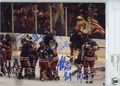 Signed 1980 USA Hockey Gold Winning 8x10 Photo by 7 - Beckett BAS Encased Photo